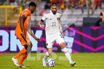 2022-06-03 - Denzel Dumfries of the Netherlands challenges Yannick Carrasco of Belgium during the UEFA Nations League 2022, League A Group 4 football match between Belgium and Netherlands on June 3, 2022 at the King Baudouin Stadium in Brussels, Belgium - FOOTBALL - NATIONS LEAGUE 2022 - BELGIUM V NETHERLANDS - UEFA NATIONS LEAGUE - SOCCER