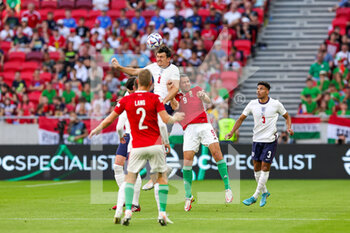 2022-06-04 - Harry Maguire (6) of England, Adam Szalai (9) of Hungary during the UEFA Nations League, League A - Group 3 football match between Hungary and England on June 4, 2022 at Puskas Arena Park in Budapest, Hungary - FOOTBALL - NATIONS LEAGUE 2022 - HUNGARY V ENGLAND - UEFA NATIONS LEAGUE - SOCCER