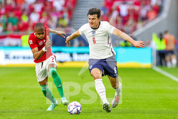 2022-06-04 - Harry Maguire (6) of England battles with Loic Nego (7) of Hungary during the UEFA Nations League, League A - Group 3 football match between Hungary and England on June 4, 2022 at Puskas Arena Park in Budapest, Hungary - FOOTBALL - NATIONS LEAGUE 2022 - HUNGARY V ENGLAND - UEFA NATIONS LEAGUE - SOCCER