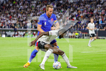 2022-06-07 - Harry Kane (9) of England tussles with Antonio Rudiger (2) of Germany during the UEFA Nations League 2022, League A - Group 3 football match between Germany and England on June 7, 2022 at Allianz Arena in Munich, Germany - FOOTBALL - NATIONS LEAGUE 2022 - GERMANY V ENGLAND - UEFA NATIONS LEAGUE - SOCCER