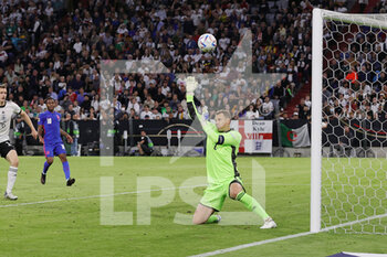 2022-06-07 - Manuel Neuer of Germany saves during the UEFA Nations League 2022, League A - Group 3 football match between Germany and England on June 7, 2022 at Allianz Arena in Munich, Germany - FOOTBALL - NATIONS LEAGUE 2022 - GERMANY V ENGLAND - UEFA NATIONS LEAGUE - SOCCER