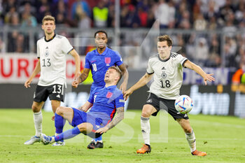 2022-06-07 - Jonas Hofmann (18) of Germany brings down Kieran Trippier (3) of England during the UEFA Nations League 2022, League A - Group 3 football match between Germany and England on June 7, 2022 at Allianz Arena in Munich, Germany - FOOTBALL - NATIONS LEAGUE 2022 - GERMANY V ENGLAND - UEFA NATIONS LEAGUE - SOCCER