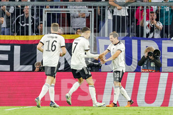 2022-06-07 - Jonas Hofmann (18) of Germany celebrates after his goal 1-0 with Kai Havertz during the UEFA Nations League 2022, League A - Group 3 football match between Germany and England on June 7, 2022 at Allianz Arena in Munich, Germany - FOOTBALL - NATIONS LEAGUE 2022 - GERMANY V ENGLAND - UEFA NATIONS LEAGUE - SOCCER
