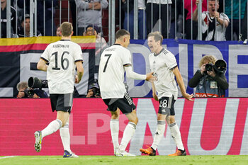 2022-06-07 - Jonas Hofmann (18) of Germany celebrates after his goal 1-0 with Kai Havertz during the UEFA Nations League 2022, League A - Group 3 football match between Germany and England on June 7, 2022 at Allianz Arena in Munich, Germany - FOOTBALL - NATIONS LEAGUE 2022 - GERMANY V ENGLAND - UEFA NATIONS LEAGUE - SOCCER