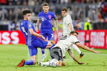 2022-06-07 - Declan Rice (4) of England tussles with Thomas Muller (13) of Germany during the UEFA Nations League 2022, League A - Group 3 football match between Germany and England on June 7, 2022 at Allianz Arena in Munich, Germany - FOOTBALL - NATIONS LEAGUE 2022 - GERMANY V ENGLAND - UEFA NATIONS LEAGUE - SOCCER