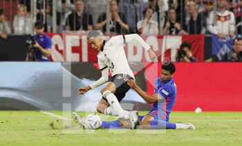 2022-06-07 - Jamal Musiala of Germany and Jude Bellingham of England during the UEFA Nations League 2022, League A - Group 3 football match between Germany and England on June 7, 2022 at Allianz Arena in Munich, Germany - FOOTBALL - NATIONS LEAGUE 2022 - GERMANY V ENGLAND - UEFA NATIONS LEAGUE - SOCCER