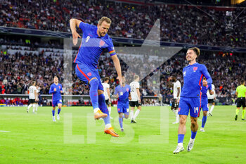 2022-06-07 - Harry Kane (9) of England celebrates after his goal 1-1 with Jack Grealish during the UEFA Nations League 2022, League A - Group 3 football match between Germany and England on June 7, 2022 at Allianz Arena in Munich, Germany - FOOTBALL - NATIONS LEAGUE 2022 - GERMANY V ENGLAND - UEFA NATIONS LEAGUE - SOCCER