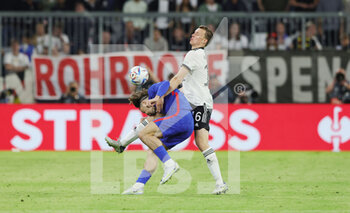 2022-06-07 - Jack Grealish of England and Lukas Klostermann of Germany during the UEFA Nations League 2022, League A - Group 3 football match between Germany and England on June 7, 2022 at Allianz Arena in Munich, Germany - FOOTBALL - NATIONS LEAGUE 2022 - GERMANY V ENGLAND - UEFA NATIONS LEAGUE - SOCCER