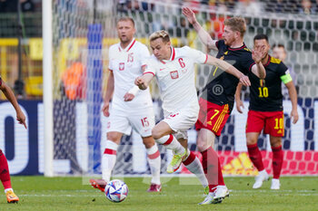 2022-06-08 - Szymon Zurkowski of Poland, Kevin De Bruyne of Belgium during the UEFA Nations League 2022, League A - Group 4 football match between Belgium and Poland on June 8, 2022 at King Baudouin Stadium in Brussels, Belgium - FOOTBALL - NATIONS LEAGUE 2022 - BELGIUM V POLAND - UEFA NATIONS LEAGUE - SOCCER