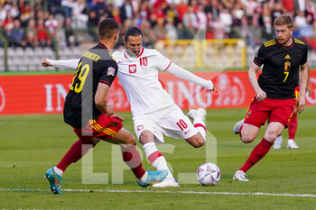 2022-06-08 - Grzegorz Krychowiak of Poland, Leander Dendoncker of Belgium during the UEFA Nations League 2022, League A - Group 4 football match between Belgium and Poland on June 8, 2022 at King Baudouin Stadium in Brussels, Belgium - FOOTBALL - NATIONS LEAGUE 2022 - BELGIUM V POLAND - UEFA NATIONS LEAGUE - SOCCER