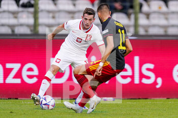2022-06-08 - Jakub Kaminski of Poland, Yannick Carrasco of Belgium during the UEFA Nations League 2022, League A - Group 4 football match between Belgium and Poland on June 8, 2022 at King Baudouin Stadium in Brussels, Belgium - FOOTBALL - NATIONS LEAGUE 2022 - BELGIUM V POLAND - UEFA NATIONS LEAGUE - SOCCER