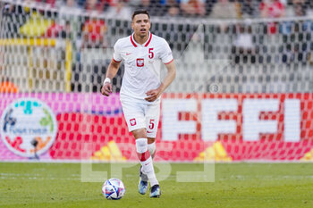 2022-06-08 - Jan Bednarek of Poland during the UEFA Nations League 2022, League A - Group 4 football match between Belgium and Poland on June 8, 2022 at King Baudouin Stadium in Brussels, Belgium - FOOTBALL - NATIONS LEAGUE 2022 - BELGIUM V POLAND - UEFA NATIONS LEAGUE - SOCCER