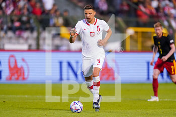 2022-06-08 - Jan Bednarek of Poland during the UEFA Nations League 2022, League A - Group 4 football match between Belgium and Poland on June 8, 2022 at King Baudouin Stadium in Brussels, Belgium - FOOTBALL - NATIONS LEAGUE 2022 - BELGIUM V POLAND - UEFA NATIONS LEAGUE - SOCCER