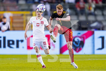 2022-06-08 - Sebastian Szymanski of Poland, Kevin De Bruyne of Belgium during the UEFA Nations League 2022, League A - Group 4 football match between Belgium and Poland on June 8, 2022 at King Baudouin Stadium in Brussels, Belgium - FOOTBALL - NATIONS LEAGUE 2022 - BELGIUM V POLAND - UEFA NATIONS LEAGUE - SOCCER