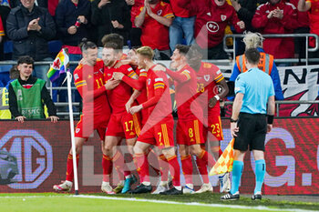 2022-06-08 - Rhys Norrington-Davies of Wales celebrates after scoring with teammates during the UEFA Nations League 2022, League A - Group 4 football match between Wales and The Netherlands on June 8, 2022 at Cardiff City Stadium in Cardiff, Wales - FOOTBALL - NATIONS LEAGUE 2022 - WALES V NETHERLANDS - UEFA NATIONS LEAGUE - SOCCER