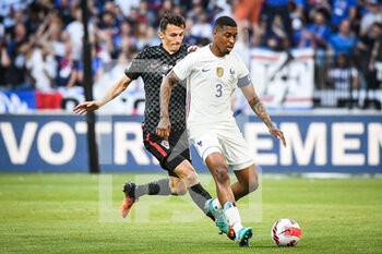 2022-06-13 - Ante BUDIMIR of Croatia and Presnel KIMPEMBE of France during the UEFA Nations League, League A - Group 1 football match between France and Croatia on June 13, 2022 at Stade de France in Saint-Denis near Paris, France - FOOTBALL - NATIONS LEAGUE - FRANCE V CROATIA - UEFA NATIONS LEAGUE - SOCCER