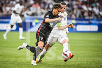 2022-06-13 - Luka MODRIC of Croatia and Adrien RABIOT of France during the UEFA Nations League, League A - Group 1 football match between France and Croatia on June 13, 2022 at Stade de France in Saint-Denis near Paris, France - FOOTBALL - NATIONS LEAGUE - FRANCE V CROATIA - UEFA NATIONS LEAGUE - SOCCER