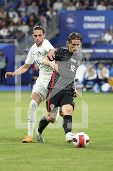 2022-06-13 - Luka Modric of Croatia, Adrien Rabiot of France (left) during the UEFA Nations League, League A - Group 1 football match between France and Croatia on June 13, 2022 at Stade de France in Saint-Denis near Paris, France - FOOTBALL - NATIONS LEAGUE - FRANCE V CROATIA - UEFA NATIONS LEAGUE - SOCCER