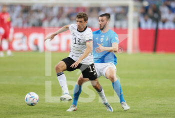 2022-06-14 - Thomas Muller of Germany and Davide Calabria of Italy during the UEFA Nations League 2022, League A - Group 3, football match between Germany and Italy on June 14, 2022 at Borussia-Park in Monchengladbach, Germany - FOOTBALL - NATIONS LEAGUE 2022 - GERMANY V ITALY - UEFA NATIONS LEAGUE - SOCCER