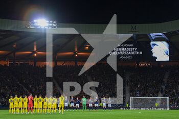 2022-09-21 - Both teams join a minute’s applause in memory of HM Queen Elizabeth during the UEFA Nations League match between Scotland and Ukraine at Hampden Park, Glasgow, United Kingdom on 21 September 2022. Photo Colin Poultney / ProSportsImages / DPPI - FOOTBALL - UEFA NATIONS LEAGUE - SCOTLAND V UKRAINE - UEFA NATIONS LEAGUE - SOCCER