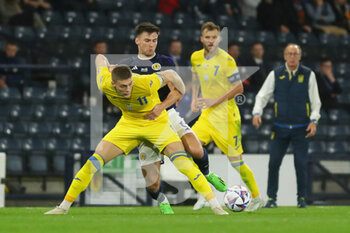 2022-09-21 - Kieran Tierney of Scotland National Team wins the ball ahed of Artem Dovbyk of Ukraine during the UEFA Nations League match between Scotland and Ukraine at Hampden Park, Glasgow, United Kingdom on 21 September 2022. Photo Colin Poultney / ProSportsImages / DPPI - FOOTBALL - UEFA NATIONS LEAGUE - SCOTLAND V UKRAINE - UEFA NATIONS LEAGUE - SOCCER