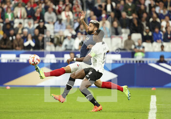 2022-09-22 - Olivier Giroud of France, David Alaba of Austria during the UEFA Nations League, League A - Group 1 football match between France and Austria on September 22, 2022 at Stade de France in Saint-Denis near Paris, France - FOOTBALL - NATIONS LEAGUE - FRANCE V AUSTRIA - UEFA NATIONS LEAGUE - SOCCER