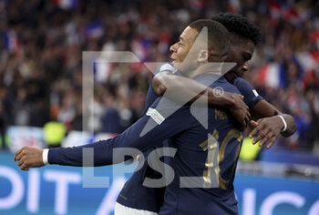 2022-09-22 - Kylian Mbappe of France celebrates his goal with Aurelien Tchouameni during the UEFA Nations League, League A - Group 1 football match between France and Austria on September 22, 2022 at Stade de France in Saint-Denis near Paris, France - FOOTBALL - NATIONS LEAGUE - FRANCE V AUSTRIA - UEFA NATIONS LEAGUE - SOCCER