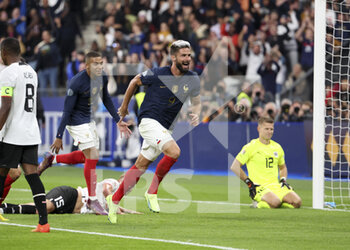 2022-09-22 - Olivier Giroud of France celebrates his goal, Kylian Mbappe (left), goalkeeper of Austria Patrick Pentz during the UEFA Nations League, League A - Group 1 football match between France and Austria on September 22, 2022 at Stade de France in Saint-Denis near Paris, France - FOOTBALL - NATIONS LEAGUE - FRANCE V AUSTRIA - UEFA NATIONS LEAGUE - SOCCER