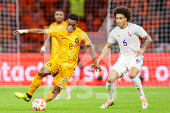 2022-09-25 - Jurrien Timber of The Netherlands, Axel Witsel of Belgium during the UEFA Nations League, League A Group 4, football match between Netherlands and Belgium on September 25, 2022 at Johan Cruijff ArenA in Amsterdam, Netherlands - FOOTBALL - NATIONS LEAGUE - NETHERLANDS V BELGIUM - UEFA NATIONS LEAGUE - SOCCER