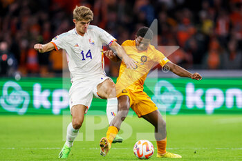 2022-09-25 - Charles de Ketelaere of Belgium, Tyrell Malacia of The Netherlands during the UEFA Nations League, League A Group 4, football match between Netherlands and Belgium on September 25, 2022 at Johan Cruijff ArenA in Amsterdam, Netherlands - FOOTBALL - NATIONS LEAGUE - NETHERLANDS V BELGIUM - UEFA NATIONS LEAGUE - SOCCER