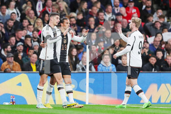2022-09-27 - Kai Havertz of Germany celebrates his goal 0-2 with Leroy Sane, Timo Werner during the UEFA Nations League, League A - Group 3 football match between England and Germany on 26 September 2022 at Wembley Stadium in London, England - FOOTBALL - NATIONS LEAGUE - ENGLAND V GERMANY - UEFA NATIONS LEAGUE - SOCCER