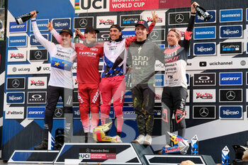03/09/2022 - The podium  - Amaury Pierron (FRA) first place - Loris Vergier (FRA) 2nd place - Iles Finn 3rd place  - UCI MOUNTAIN BIKE WORLD CUP - VAL DI SOLE 2022 - ELITE MEN AND WOMEN DOWNHILL RACE - MTB - MOUNTAIN BIKE - CICLISMO