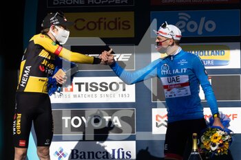 2022-03-13 - (L-R) Jonas Vingegaard Rasmussen of Denmark and Team Jumbo - Visma on second place, and race winner Tadej Pogacar of Slovenia pose on the podium ceremony after the 57th Tirreno-Adriatico 2022 - Stage 7 a 159km stage from San Benedetto del Tronto to San Benedetto del Tronto / #TirrenoAdriatico / #WorldTour / on March 13, 2022 in San Benedetto del Tronto, Italy. - 7^ TAPPA SAN BENEDETTO DEL TRONTO - TIRRENO - ADRIATICO - CYCLING
