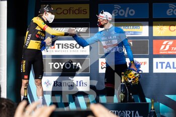 2022-03-13 - (L-R) Jonas Vingegaard Rasmussen of Denmark and Team Jumbo - Visma on second place, and race winner Tadej Pogacar of Slovenia pose on the podium ceremony after the 57th Tirreno-Adriatico 2022 - Stage 7 a 159km stage from San Benedetto del Tronto to San Benedetto del Tronto / #TirrenoAdriatico / #WorldTour / on March 13, 2022 in San Benedetto del Tronto, Italy. - 7^ TAPPA SAN BENEDETTO DEL TRONTO - TIRRENO - ADRIATICO - CYCLING