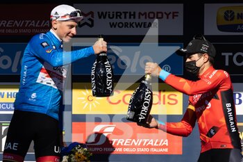 2022-03-13 - (L-R) Race winner Tadej Pogacar of Slovenia and UAE Team Emirates Blue Leader Jersey and Mikel Landa Meana of Spain and Team Bahrain Victorious on third place pose on the podium ceremony after the 57th Tirreno-Adriatico 2022 - Stage 7 a 159km stage from San Benedetto del Tronto to San Benedetto del Tronto / #TirrenoAdriatico / #WorldTour / on March 13, 2022 in San Benedetto del Tronto, Italy. - 7^ TAPPA SAN BENEDETTO DEL TRONTO - TIRRENO - ADRIATICO - CYCLING