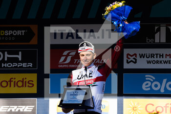 2022-03-13 - Tadej Pogacar of Slovenia and UAE Team Emirates celebrates at podium as most aggressive prize winner during the 57th Tirreno-Adriatico 2022 - Stage 7 a 159km stage from San Benedetto del Tronto to San Benedetto del Tronto / #TirrenoAdriatico / #WorldTour / on March 13, 2022 in San Benedetto del Tronto, Italy. ©Photo: Cinzia Camela. - 7^ TAPPA SAN BENEDETTO DEL TRONTO - TIRRENO - ADRIATICO - CYCLING