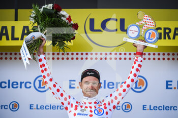 2022-07-05 - EF Education-Easypost team's Danish rider Magnus CORT NIELSEN wearing the best climber polka dot jersey celebrates on the podium during the Tour de France 2022, cycling race stage 4, Dunkerque - Calais (171,5 Km) on July 5, 2022 in Calais, France - CYCLING - TOUR DE FRANCE 2022 - STAGE 4 - TOUR DE FRANCE - CYCLING