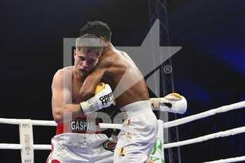09/04/2022 - Christian Gasparri (ITA) vs Santiago Garces (COL) during the IBO World Lightweight Youth Title fight, 9th April 2022, Palazzetto dello Sport, Civitavecchia, Rome, Italy. - IBO WORLD LIGHTWEIGHT YOUTH TITLE - GASPARRI VS GARCES - BOXE - CONTATTO