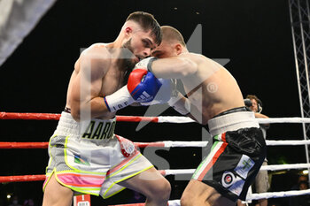 08/07/2022 - Pietro “The Butcher” Rossetti (ITA) vs Aaron Alhambra (ESP) during the International Welterweight Title IBF  on 8th July 2022 at Campo Roma, Rome, Italy - IBF WELTER INTERNATIONAL TITLE - ROSSETTI VS ALHAMBRA - BOXE - CONTATTO