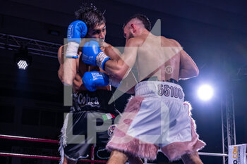 2022-11-11 - Daniel Spada vs Marvin Demollari during boxing match valid for the Italian Lightweight title - BOXING, ITALIAN LIGHTWEIGHT TITLE - BOXING - CONTACT