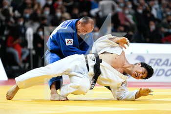 2022-02-05 - Men's -66 kg, Baskhuu Yondonperenlei of Mongolia (blue) throws An Baul of South Corea (white) during the gold medal contest of the Paris Grand Slam 2022, IJF World Judo Tour on February 5, 2022 at Accor Arena in Paris, France - PARIS GRAND SLAM 2022, IJF WORLD JUDO TOUR - JUDO - CONTACT