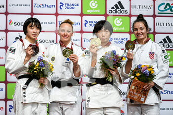 2022-02-05 - (LtoR) Japan's Niizoe Saki (silver), France's Margaux Pinot (gold), Japan's Ono Yoko (bronze) and Croatia's Barbara Matic pose during the podium ceremony of the women's -70kg category during the Paris Grand Slam 2022, IJF World Judo Tour on February 6, 2022 at Accor Arena in Paris, France - PARIS GRAND SLAM 2022, IJF WORLD JUDO TOUR - JUDO - CONTACT