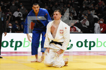 2022-02-07 - Piotr Kuczera (POL) competes on men's -100 kg during the Paris Grand Slam 2022, IJF World Judo Tour on February 6, 2022 at Accor Arena in Paris, France - PARIS GRAND SLAM 2022, IJF WORLD JUDO TOUR - JUDO - CONTACT