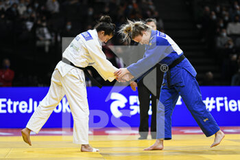 2022-02-06 - Women's -63 kg Geke van den Berg of the Netherlands and Amina Belkadi of Algeria shake hands and and salute during the Paris Grand Slam 2022, IJF World Judo Tour on February 5, 2022 at Accor Arena in Paris, France - PARIS GRAND SLAM 2022, IJF WORLD JUDO TOUR  - JUDO - CONTACT