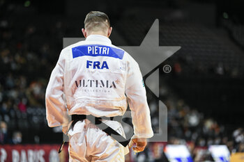 2022-02-06 - Men's -81 kg, Loic Pietri (from back) of France competes during the Paris Grand Slam 2022, IJF World Judo Tour on February 6, 2022 at Accor Arena in Paris, France - PARIS GRAND SLAM 2022, IJF WORLD JUDO TOUR  - JUDO - CONTACT