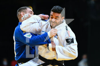 2022-02-06 - Men's -81 kg, Sagi Muki of Israel (white) and Loic Pietri of France (blue) competes during the Paris Grand Slam 2022, IJF World Judo Tour on February 6, 2022 at Accor Arena in Paris, France - PARIS GRAND SLAM 2022, IJF WORLD JUDO TOUR  - JUDO - CONTACT