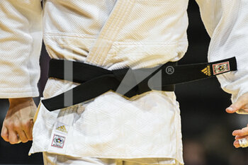 2022-02-06 - Illustration picture shows a white judogi/kimono of a judoka/judo fighter (black belt) during the Paris Grand Slam 2022, IJF World Judo Tour on February 6, 2022 at Accor Arena in Paris, France - PARIS GRAND SLAM 2022, IJF WORLD JUDO TOUR  - JUDO - CONTACT