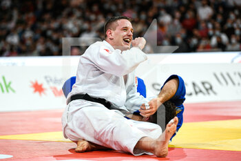 2022-02-06 - Men's -90 kg, Mihael Zgank of Turkey competes and celebrates after winning the bronze medal constest during the Paris Grand Slam 2022, IJF World Judo Tour on February 6, 2022 at Accor Arena in Paris, France - PARIS GRAND SLAM 2022, IJF WORLD JUDO TOUR  - JUDO - CONTACT