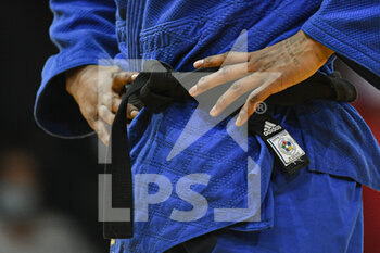2022-02-06 - Illustration picture shows a judoka/judo fighter (black belt) with his blue judogi/kimono during the Paris Grand Slam 2022, IJF World Judo Tour on February 6, 2022 at Accor Arena in Paris, France - PARIS GRAND SLAM 2022, IJF WORLD JUDO TOUR  - JUDO - CONTACT