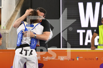 2022-06-03 - Giada AL HALWANI (ITA) vs Inese TARVIDA (LAT) during R16 round of World Taekwondo Grand Prix at Foro Italico, Nicola Pietrangeli Stadium, 3th June 2022, Rome, Italy. - 2022 WORLD TAEKWONDO ROMA GRAND PRIX (DAY1) - TAEKWONDO - CONTACT